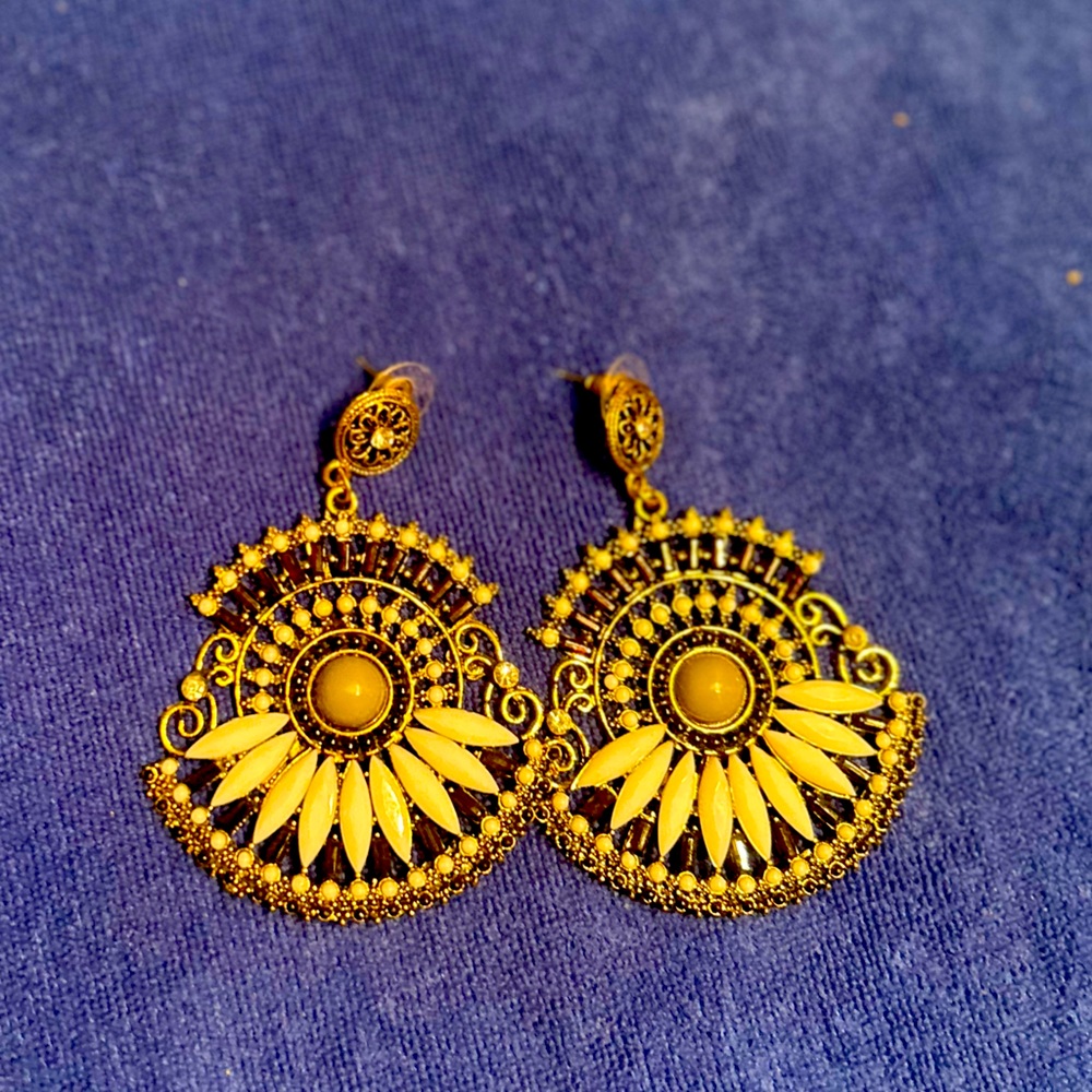 Fashion dangle earrings.